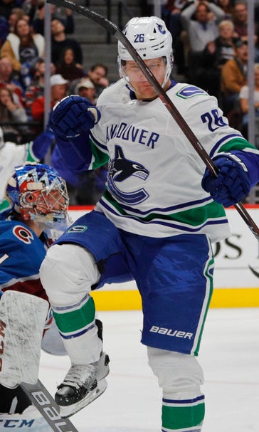 Roussel, Virtanen lead Canucks to 5-1 win over Avalanche